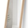 Stojací zrcadlo s dřevěným rámem 45x196 cm Bellwood – Umbra. Cvičení